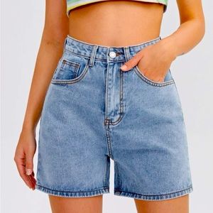 Straight Leg Solid Denim shorts. Size(M) , color light wash.